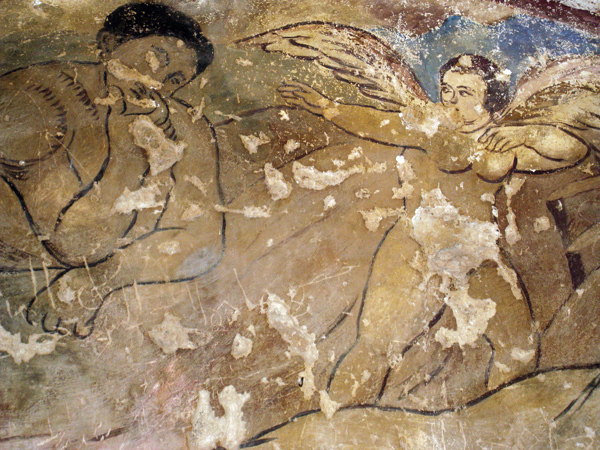 one of the many frescos covering the walls and dome of Qasr Amra