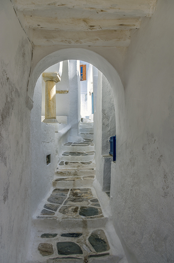 a typical street in Kastro, note the Roman era column, scavenged from ancient remains when the fortified Medieval village was built