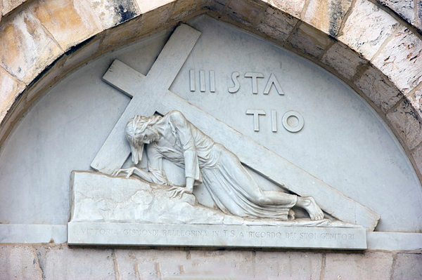 Jesus falls for the first time, 3rd Station of the Cross.