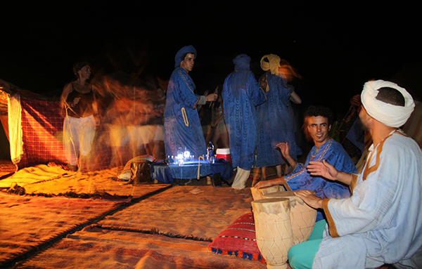 sing and dance with local musicians in a Sahara desert camp on your Morocco vacation