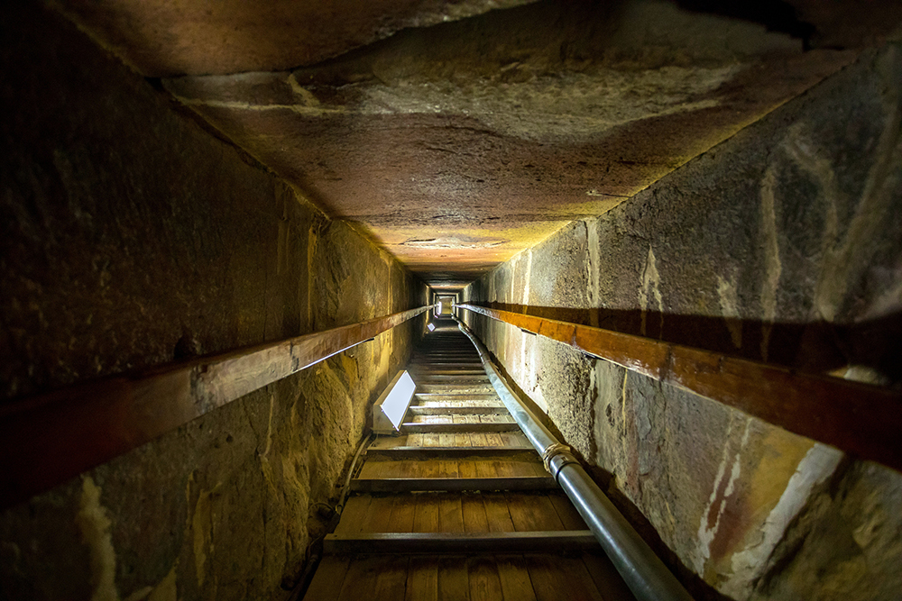 Inside the Khufu pyramid, the first and largest of the Giza pyramids. Passages inside the pyramids can be quite narrow with very low ceilings.